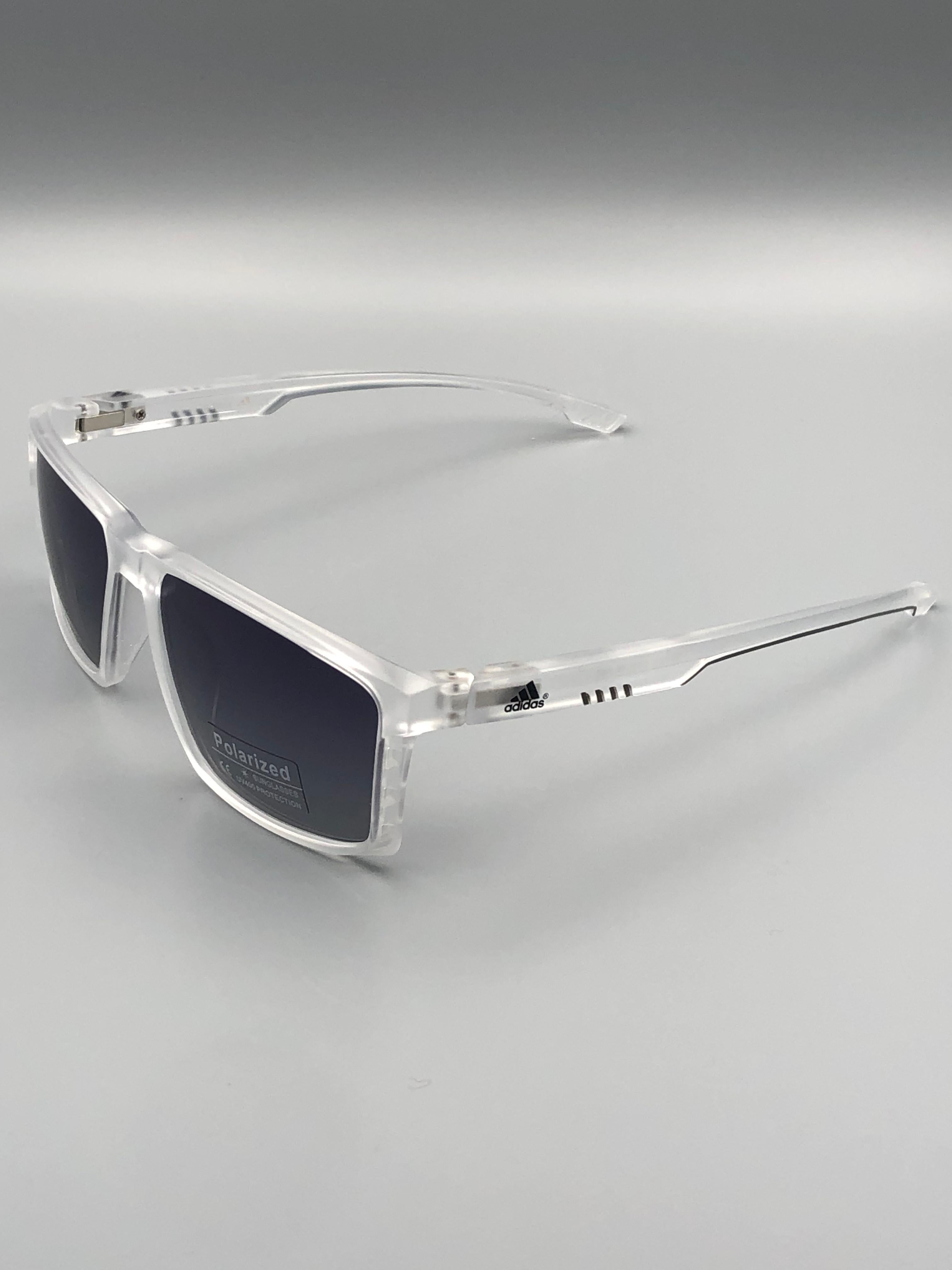 Adidas Premium Transparent Frame Polarized Sunglasses – UV Protection | Élovris Exclusive Eyewear Collection